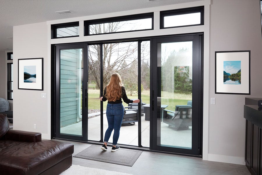 Retractable screen on sliding glass door with BBQ