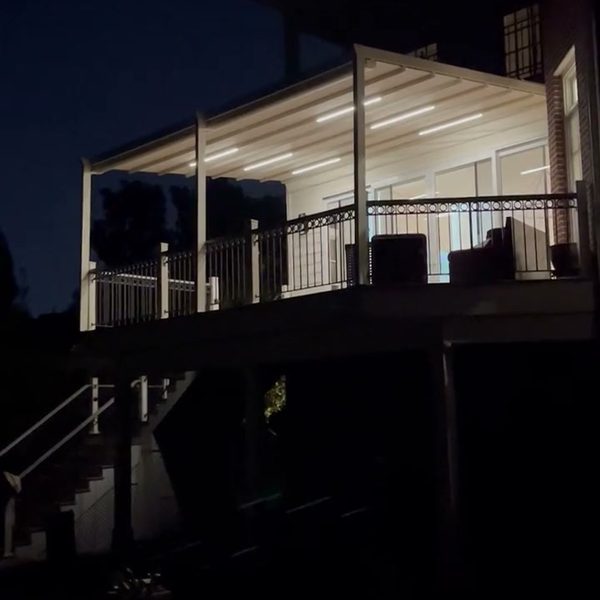 Covered deck lit up at night