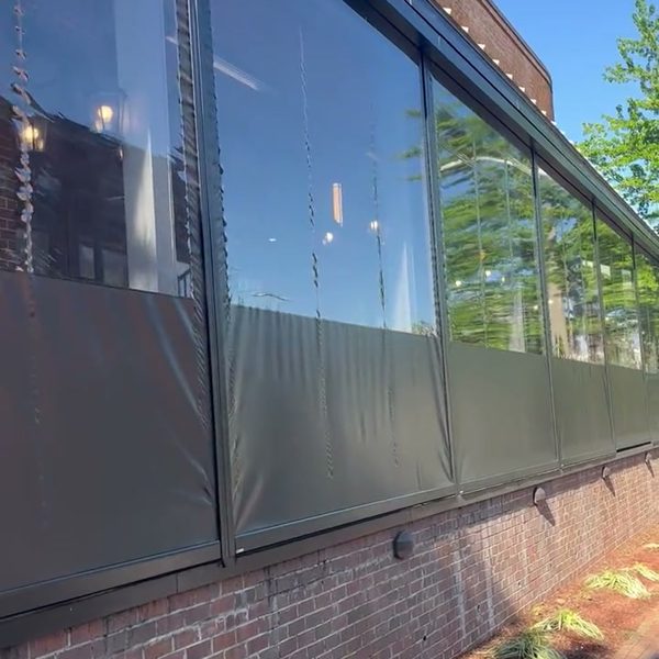 Motorized screens on a restaurant