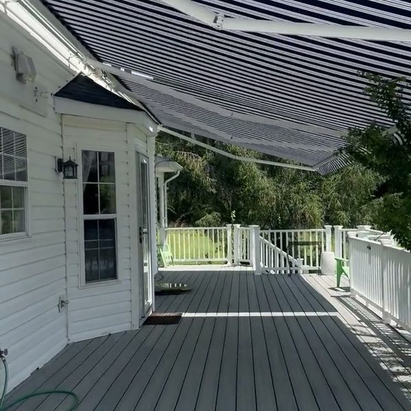 Navy striped awning over a long deck