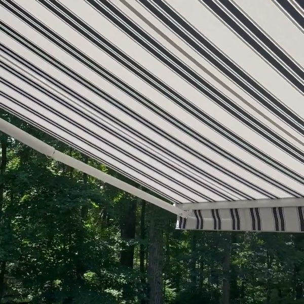 Striped deck awning, family backyard